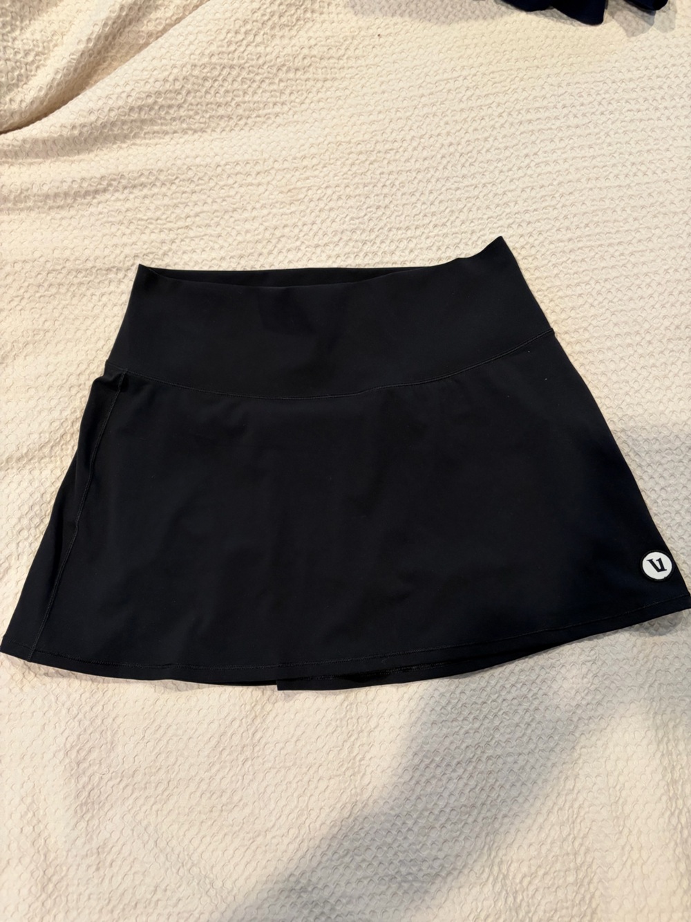 Vuori Black Circle Skirt with Logo Emblem